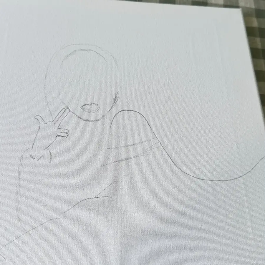Pencil outline of a reclining woman on bare canvas